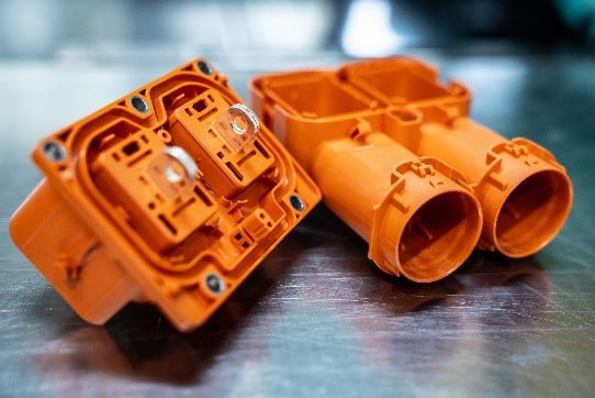 Orange PIN compounds for electrified vehicles